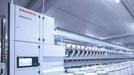 Open-end spinning machine for industrial yarn production